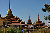 Inle Lake Myanmar. Phaung Daw Oo Paya. Enshrined in the pagoda are five small ancient Buddha images that have been transformed into amorphous blobs by the sheer volume of gold leaf applied by devotees.  